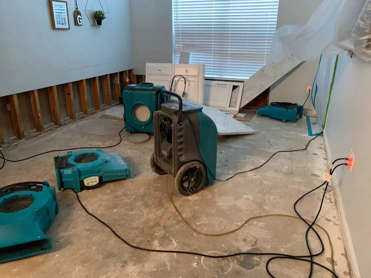 Dehumidifier in flood-cut room for Water Damage Restoration in Montville